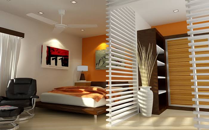 Modern bedroom interior with wooden bed, orange accent wall, white slatted room divider, and contemporary decor
