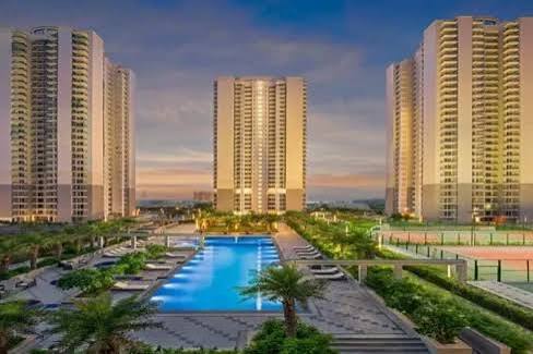 Luxury residential apartment complex with swimming pool and landscaped gardens